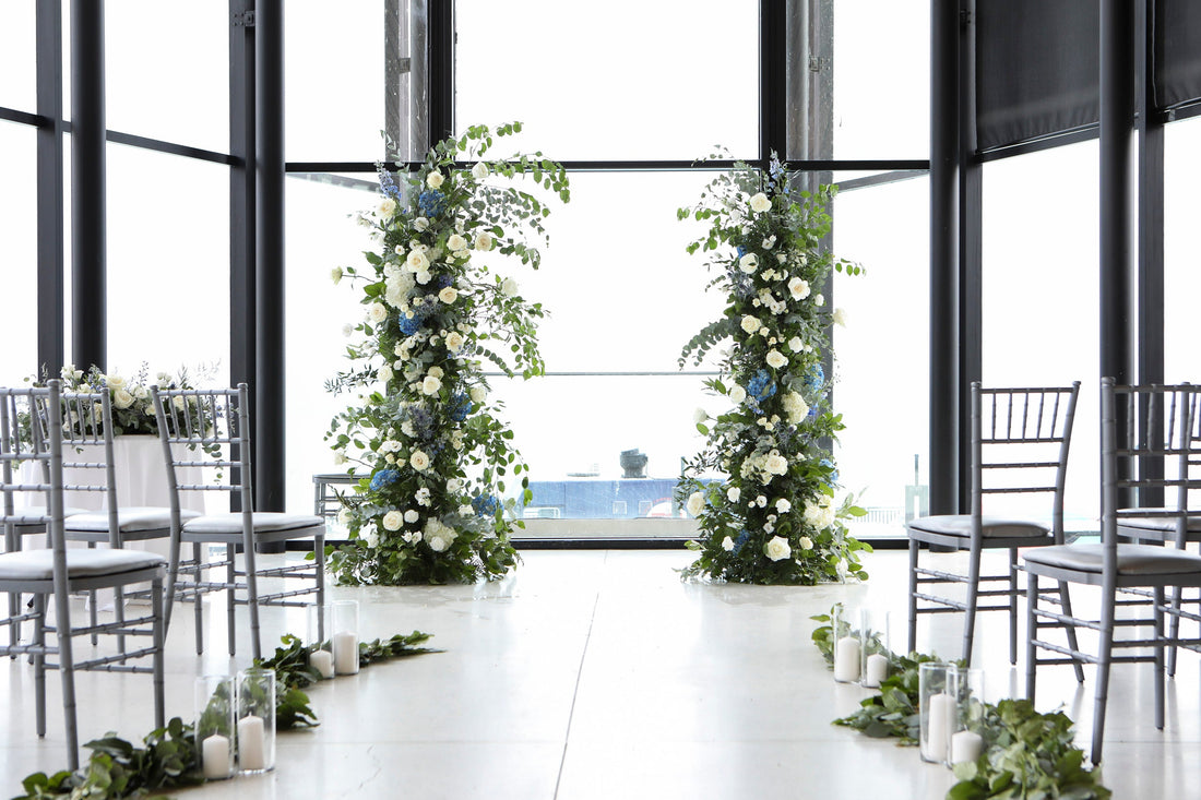 Spencer’s at the Waterfront wedding flowers – waterfront ceremony setup