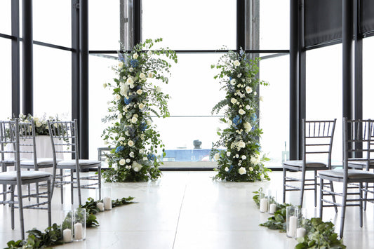 Spencer’s at the Waterfront wedding flowers – waterfront ceremony setup