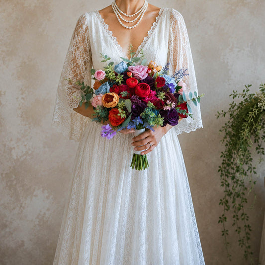 Burgundy jewel tone silk wedding bouquet with ranunculus, roses and mixed blooms